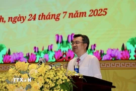 Ông Nguyễn Thanh Nghị, Phó Bí thư thường trực Thành ủy Thành phố Hồ Chí Minh phát biểu tại kỳ họp. (Ảnh: Thanh Vũ/TTXVN)