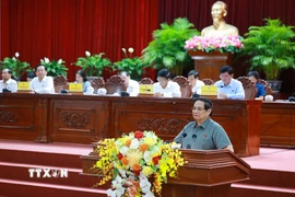 Thủ tướng Phạm Minh Chính phát biểu tại hội nghị tiếp xúc cử tri thành phố Cần Thơ trước Kỳ họp thứ 10, Quốc hội khóa XV. (Ảnh: Dương Giang/TTXVN)