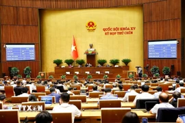 Quốc hội thông qua Nghị quyết về miễn, hỗ trợ học phí đối với trẻ em mầm non, học sinh phổ thông, người học chương trình giáo dục phổ thông tại các cơ sở giáo dục trong hệ thống giáo dục quốc dân. (Ảnh: Doãn Tấn/TTXVN)