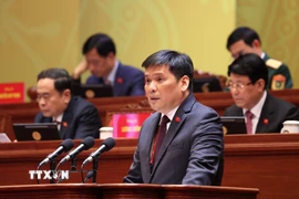 Đồng chí Nguyễn Thanh Bình, Phó Trưởng Ban Tổ chức Trung ương, tham luận về vấn đề “Xây dựng, hoàn thiện tổ chức bộ máy của hệ thống chính trị đáp ứng yêu cầu phát triển đất nước trong kỷ nguyên mới.” (Ảnh: TTXVN)