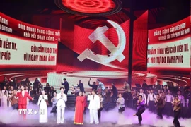 Tiết mục biểu diễn tại Chương trình hòa nhạc chính luận nghệ thuật đặc biệt “Mãi mãi niềm tin theo Đảng.” (Ảnh: Minh Đức/TTXVN)
