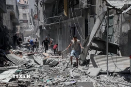 Cảnh đổ nát do chiến sự tại Dải Gaza. (Ảnh: THX/TTXVN)