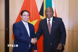 Thủ tướng Phạm Minh Chính hội kiến Tổng thống Cộng hòa Nam Phi Matamela Cyril Ramaphosa. (Ảnh: Dương Giang/TTXVN)