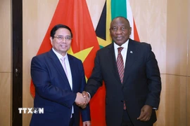 Thủ tướng Phạm Minh Chính hội kiến Tổng thống Cộng hòa Nam Phi, Chủ tịch G20 năm 2025, Matamela Cyril Ramaphosa. (Ảnh: Dương Giang/TTXVN)