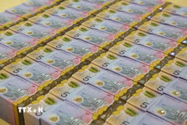 Đồng AUD. (Ảnh: AFP/TTXVN)