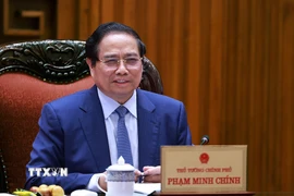 Thủ tướng Phạm Minh Chính làm việc với lãnh đạo Tập đoàn CT Group về phát triển lĩnh vực khoa học công nghệ cao. (Ảnh: Dương Giang/TTXVN)