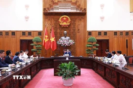 Thủ tướng Phạm Minh Chính làm việc với lãnh đạo Tập đoàn CT Group về phát triển lĩnh vực khoa học công nghệ cao. (Ảnh: Dương Giang/TTXVN)