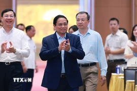 Thủ tướng Phạm Minh Chính đến Phiên họp lần thứ 3 BCĐ về phát triển khoa học, công nghệ, đổi mới sáng tạo, chuyển đổi số và Đề án 06. (Ảnh: Dương Giang/TTXVN)