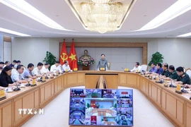 Phó Thủ tướng Trần Hồng Hà chủ trì cuộc họp ứng phó với cơn bão số 3. (Ảnh: Văn Điệp/TTXVN)