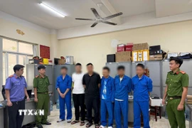 Các đối tượng bị khởi tố, bắt tạm giam. (Ảnh: TTXVN phát)