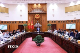 Thủ tướng Phạm Minh Chính chủ trì họp về dự án quy hoạch xây dựng cảnh quan sông Hồng. (Ảnh: Dương Giang/TTXVN)