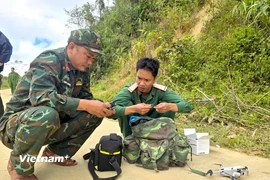 Bộ Chỉ huy Quân sự thành phố Đà Nẵng sử dụng 2 UAV rà quét khu vực sạt lở để tìm kiếm người mất tích và lên phương án cứu hộ, cứu nạn hiệu quả. (Ảnh: Thanh Phong/Vietnam+)