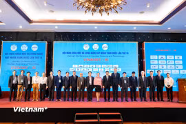Đại diện lãnh đạo các cơ quan, tổ chức trong nước và quốc tế tham dự Hội nghị Khoa học và Công nghệ hạt nhân toàn quốc lần thứ 16. (Ảnh: Thanh Phong/Vietnam+)