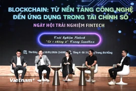 Tọa đảm giữa các chuyên gia về các vấn đề pháp lý liên quan đến tài sản số. (Ảnh: Thanh Phong/Vietnam+)