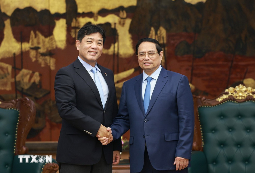 Thủ tướng Phạm Minh Chính tiếp ông Yukihito Honda. (Ảnh: Dương Giang/TTXVN)