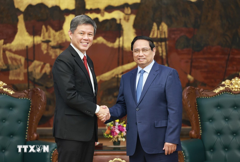 Thủ tướng Phạm Minh Chính tiếp ông Chan Chun Sing, Phó Tổng Thư ký Đảng Hành động Nhân dân Singapore, Bộ trưởng Điều phối các Dịch vụ Công kiêm Bộ trưởng Quốc phòng Singapore. (Ảnh: Dương Giang/TTXVN)