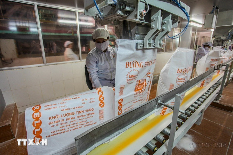 Dây chuyền đóng bao sản phẩm đường tinh luyện (RE). (Ảnh: Trọng Đạt/TTXVN)