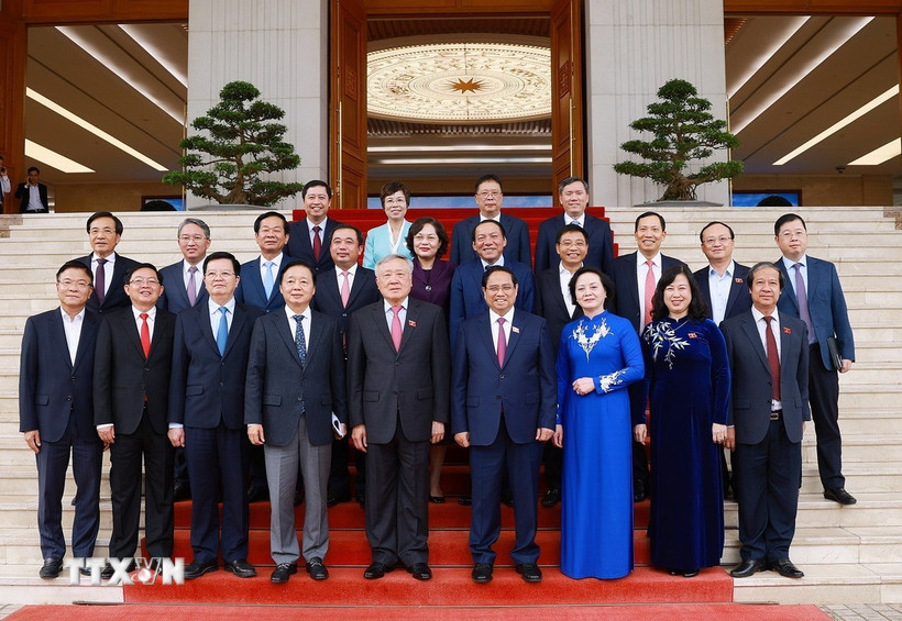 Thủ tướng Chính phủ Phạm Minh Chính và các Phó Thủ tướng Chính phủ, Bộ trưởng, thành viên Chính phủ nhiệm kỳ 2021-2026. (Ảnh: Dương Giang/TTXVN)