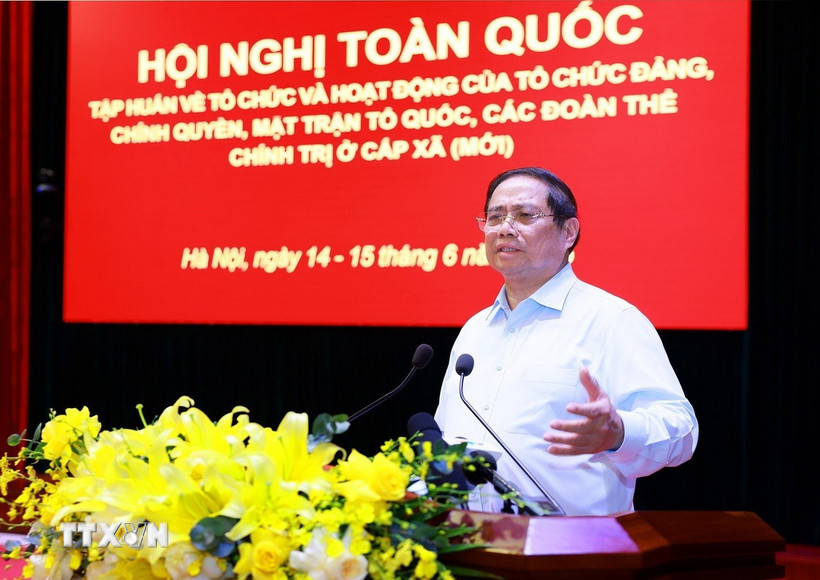 Thủ tướng Phạm Minh Chính phát biểu bế mạc Hội nghị toàn quốc tập huấn về tổ chức và hoạt động của tổ chức Đảng, chính quyền, Mặt trận Tổ quốc, các đoàn thể chính trị ở cấp xã (mới). (Ảnh: Dương Giang/TTXVN)