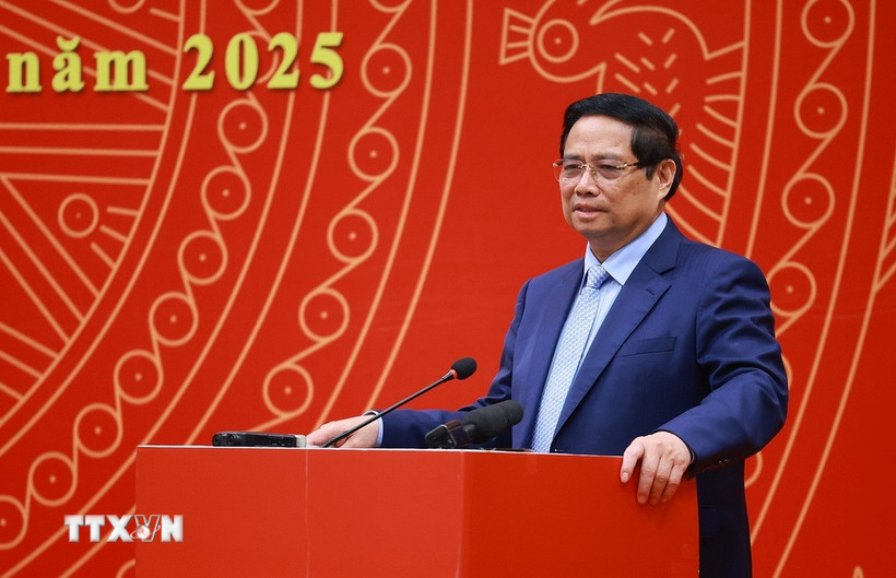 Thủ tướng Phạm Minh Chính chia sẻ với cộng đồng người Việt Nam tại Trung Quốc. (Ảnh: Dương Giang/TTXVN)