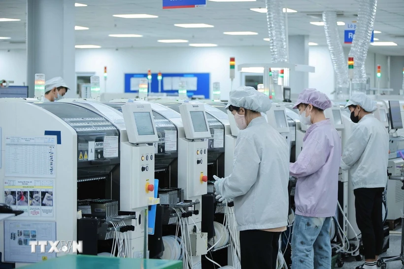 Nhiều hệ thống máy móc hiện đại, tiên tiến nhất đã được các doanh nghiệp FDI đầu tư sản xuất. (Ảnh: Hoàng Hiếu/TTXVN)