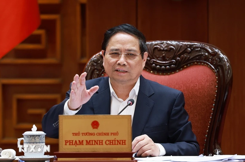 Thủ tướng Phạm Minh Chính chủ trì cuộc họp cho ý kiến vào dự thảo Luật Quy hoạch trình Bộ Chính trị. (Ảnh: Dương Giang/TTXVN)
