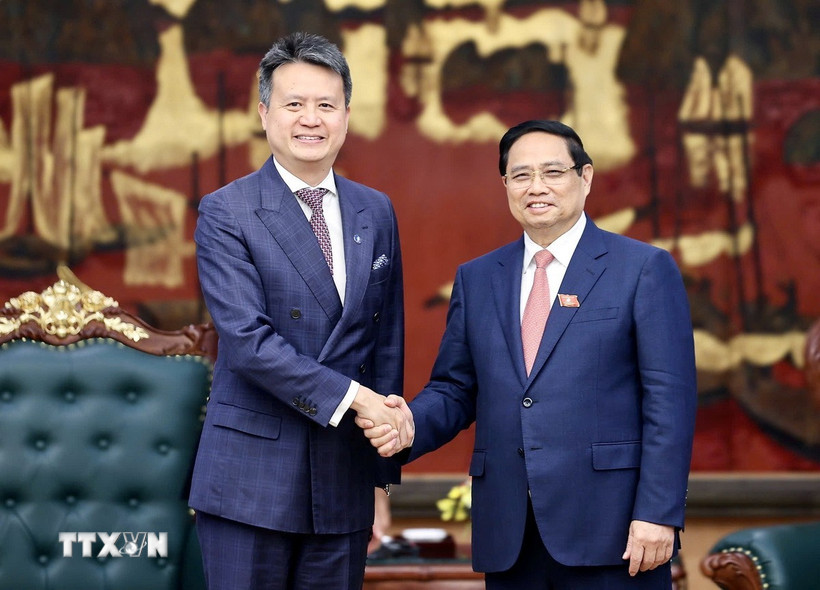 Thủ tướng Phạm Minh Chính tiếp ông Daren Tang, Tổng giám đốc Tổ chức Sở hữu trí tuệ thế giới (WIPO). (Ảnh: Dương Giang/TTXVN)