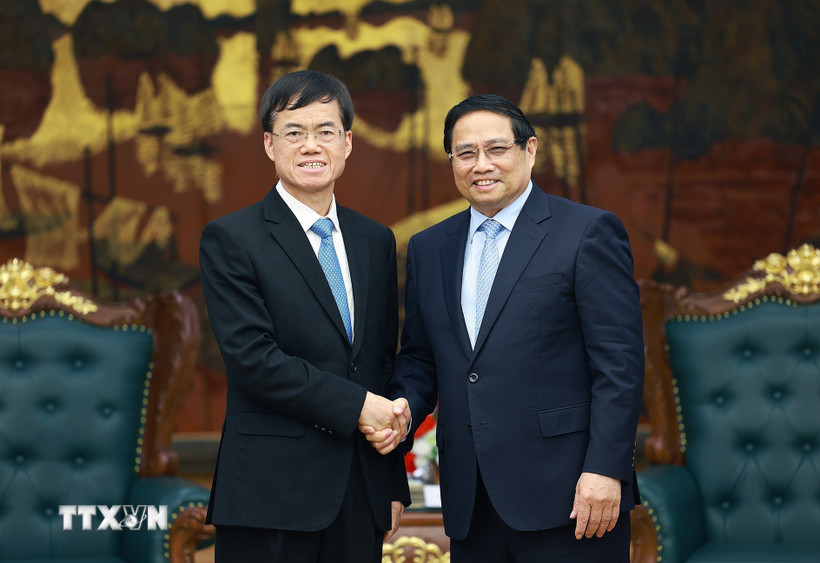 Thủ tướng Phạm Minh Chính tiếp ông Bùi Kim Giai, Bộ trưởng Bộ Công tác Quân nhân xuất ngũ Trung Quốc. (Ảnh: Dương Giang/TTXVN)