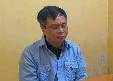 Bị can Phạm Văn Long, Hiệu trưởng trường Cao đẳng Du lịch Hà Nội. (Ảnh: Công an cung cấp)