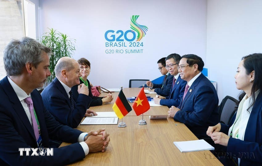Nhân chuyến tham dự Hội nghị thượng đỉnh G20 tại Rio de Janeiro (Brazil), chiều 18/11/2024, Thủ tướng Phạm Minh Chính gặp Thủ tướng Đức Olaf Scholz. (Ảnh: Dương Giang/TTXVN)