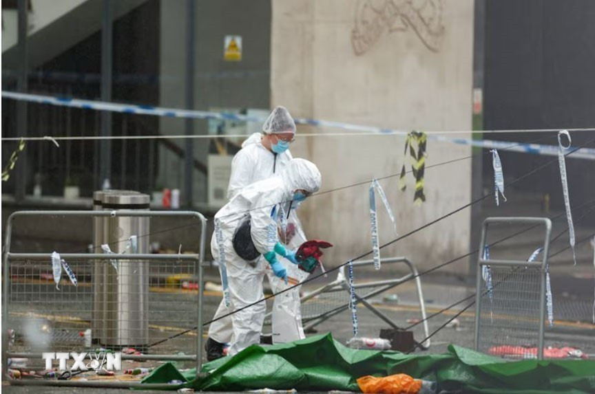 Cảnh sát đã bắt giữ một người đàn ông 53 tuổi tại địa phương ngay sau đó. Thông tin về nghi phạm cũng được công bố nhằm trấn an dư luận rằng đây không phải là vụ tấn công khủng bố của đối tượng Hồi giáo. (Ảnh: Reuters/TTXVN)