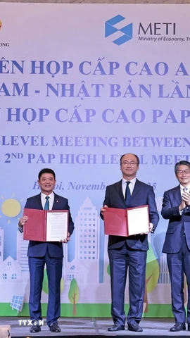 Tại phiên họp Ngân hàng Đầu tư và Phát triển (BIDV) và Ngân hàng Hợp tác quốc tế Nhật Bản (JBIC) trao đổi Biên bản hợp tác. (Ảnh: Trần Việt/TTXVN)