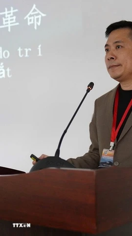 Đại diện doanh nghiệp đến từ Trung Quốc chia sẻ kinh nghiệm tại buổi giao lưu. (Ảnh: Khoa Chương/TTXVN)