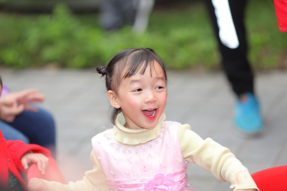 nụ cười rạng rỡ chào xuân (Ảnh: PV/Vietnam+)