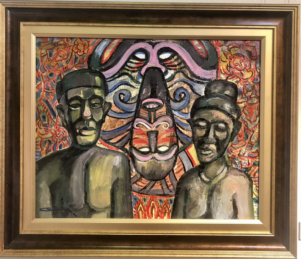 Bức ''Lễ hội ăn chay'' khắc họa Lễ hội mãn chay của người Lào, kéo dài từ rằm tháng Tám đến rằm tháng 11 theo Phật lịch. Trong suốt ba tháng, người dân kiêng rượu, thuốc lá, những hoạt động được coi là phàm tục... (Ảnh: Minh Anh/Vietnam+)