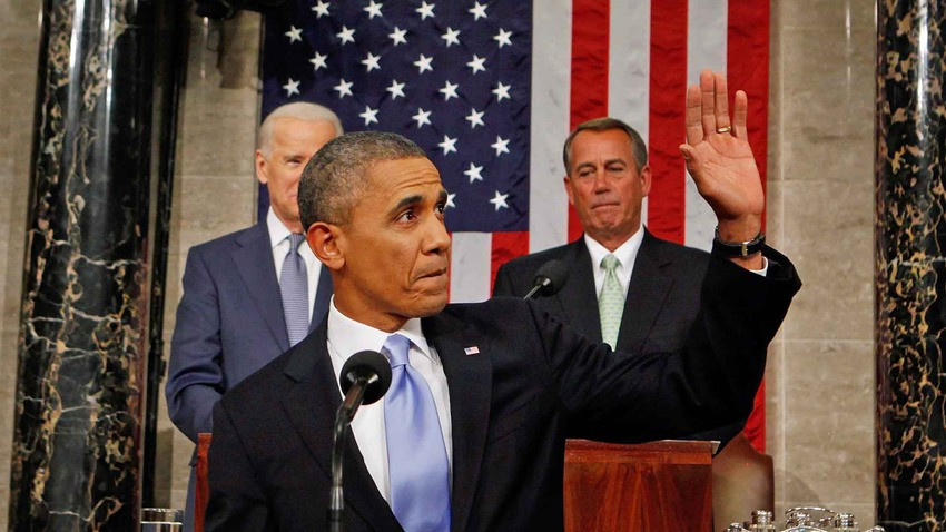 Tổng thống Obama vẫy chào khi chuẩn bị đọc diễn văn (Ảnh: Getty Images)