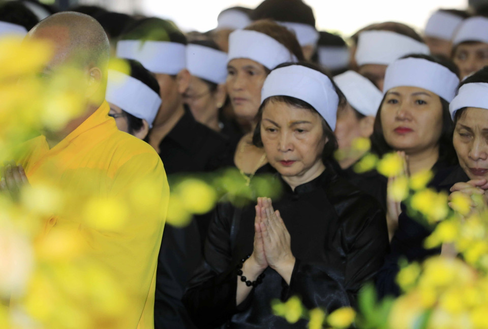 Gia đình nguyên Tổng Bí thư Đỗ Mười tại lễ truy điệu. (Ảnh: Nhan Sáng/TTXVN)