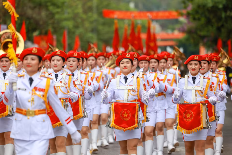 Khối nữ quân nhạc rạng rỡ. (Ảnh: Minh Sơn/Vietnam+)