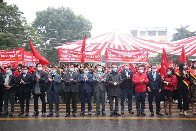 Hoạt động đi bộ diễu hành để hưởng ứng chương trình. (Ảnh: PV/Vietnam+)