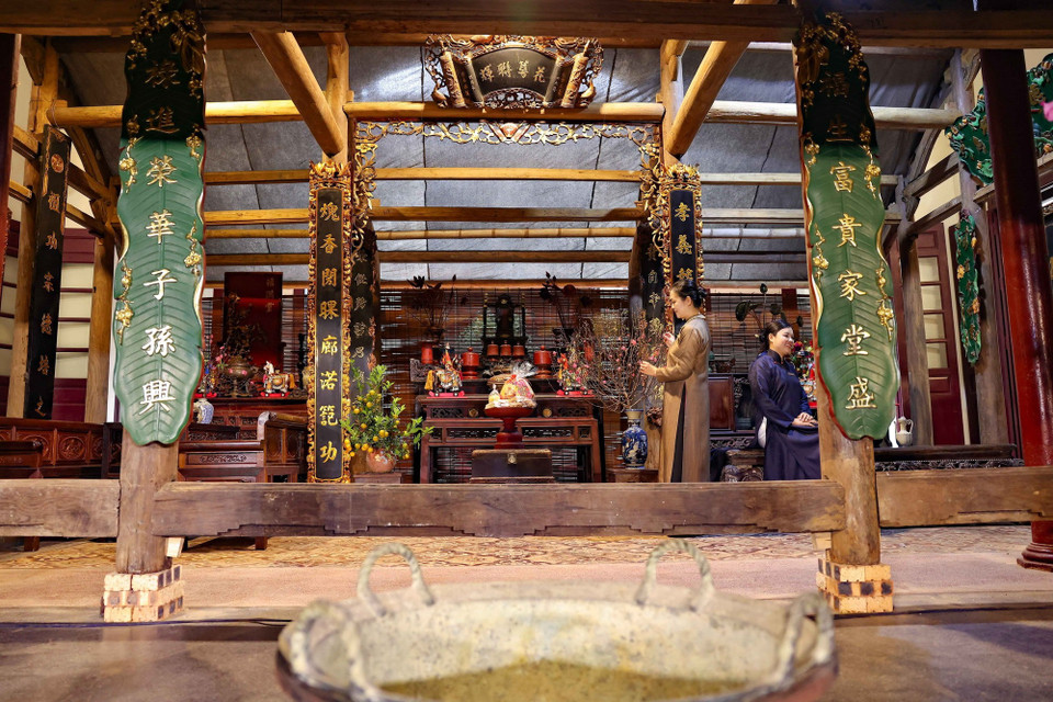 Di tích số 22 Hàng Buồm lần đầu tiên được lựa chọn để tái hiện không gian Tết và chợ Tết vùng đồng bằng Bắc Bộ. (Ảnh: Thanh Tùng/TTXVN)