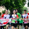Những khoảnh khắc vận động viên chinh phục giải chạy marathon lớn nhất Thủ đô