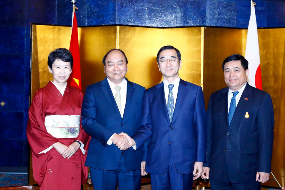 Thủ tướng Nguyễn Xuân Phúc tiếp Chủ tịch Tổ chức Xúc tiến Thương mại Nhật Bản (JETRO) Nobuhiko Sasaki. (Ảnh: Thống Nhất/TTXVN)