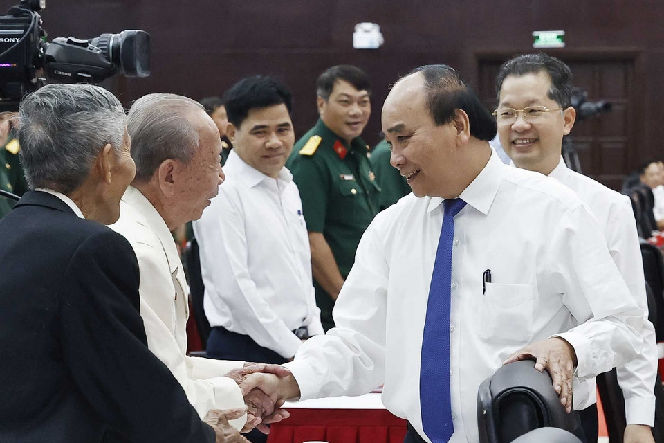 Chủ tịch nước và các đại biểu tham dự hội thảo. (Ảnh: Thống Nhất/TTXVN)