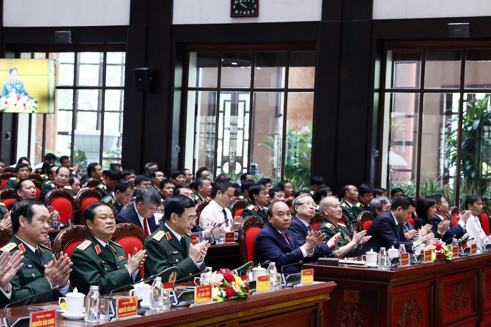 Chủ tịch nước Nguyễn Xuân Phúc cùng các đại biểu tham dự buổi lễ. (Ảnh: Thống Nhất/TTXVN)