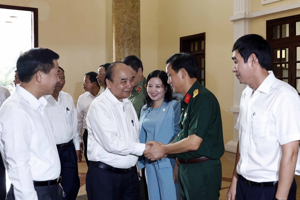 Chủ tịch nước và các đại biểu dự buổi làm việc. (Ảnh: Thống Nhất/TTXVN)