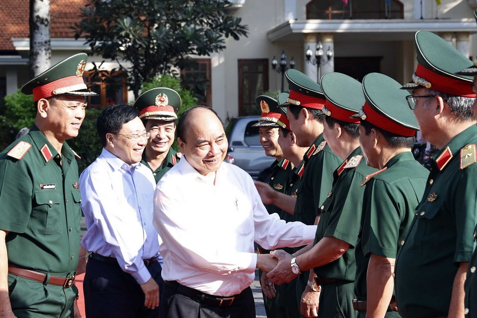 Chủ tịch nước cùng các đại biểu tham dự hội thảo. (Ảnh: Thống Nhất/TTXVN)