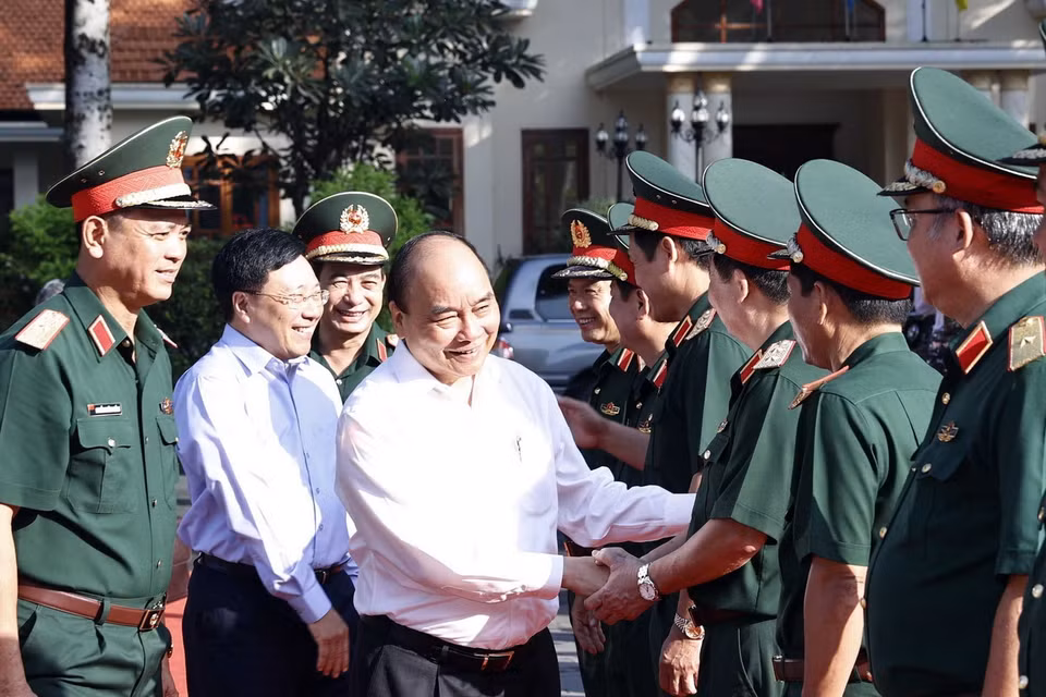 Chủ tịch nước cùng các đại biểu tham dự hội thảo. (Ảnh: Thống Nhất/TTXVN)