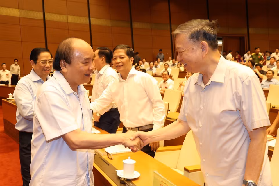 Chủ tịch nước Nguyễn Xuân Phúc, Thủ tướng Chính phủ Phạm Minh Chính và các vị lãnh đạo Đảng, Nhà nước dự hội nghị. (Ảnh: Trí Dũng/TTXVN)
