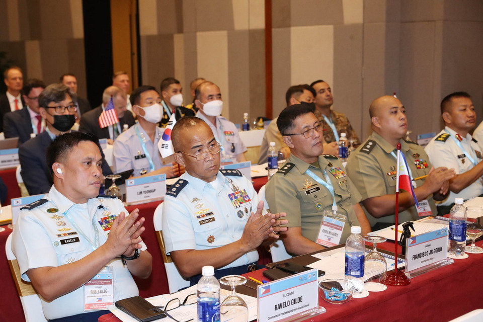 Tùy viên quân sự các nước tham dự hội thảo. (Ảnh: Trọng Đức/TTXVN)