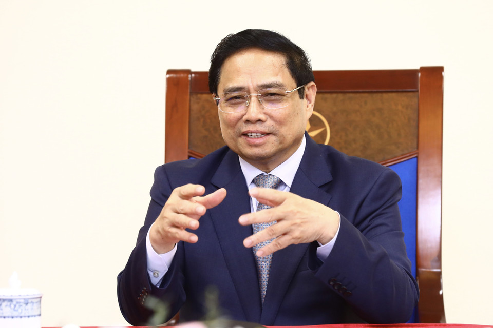 Thủ tướng Phạm Minh Chính điện đàm với Thủ tướng Trung Quốc Lý Cường. (Ảnh: Lâm Khánh/TTXVN)